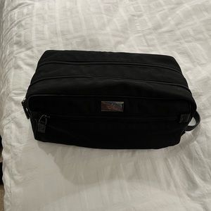 Gucci toiletry kit with multilple zippered compartments